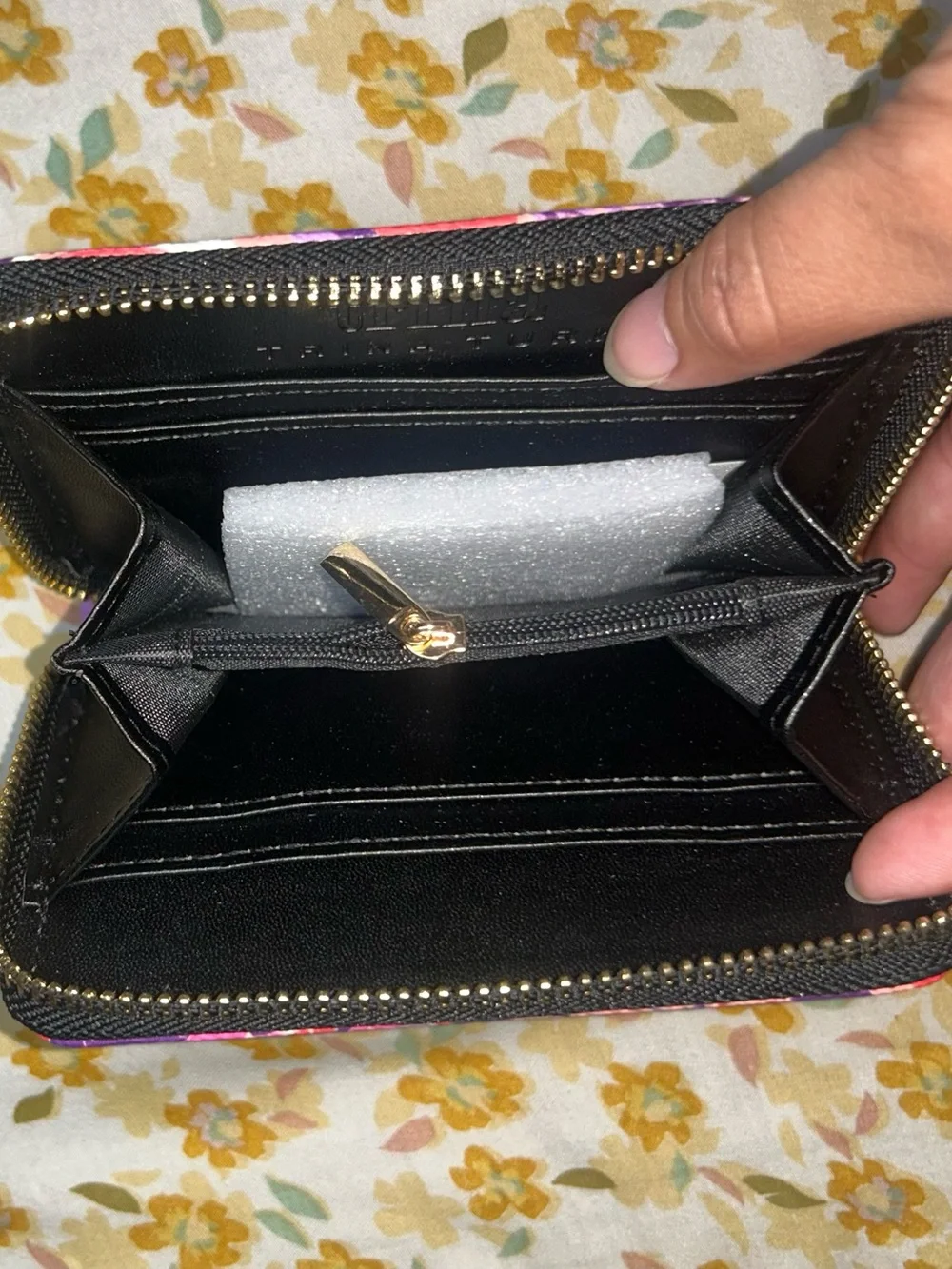 Trina Turk wallet catching